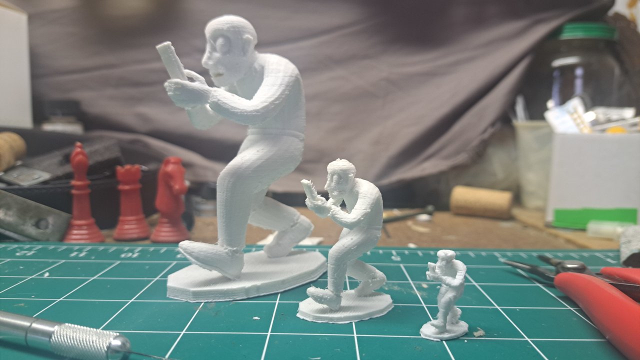 Anaglyph Stereoscopic image of 3D printed character walking while doomscrolling